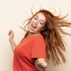 Pretty girl doing a "Happy Dance" to support her opioid addiction recovery